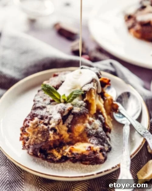 blueberry strata bake with whipped cream and maple syrup