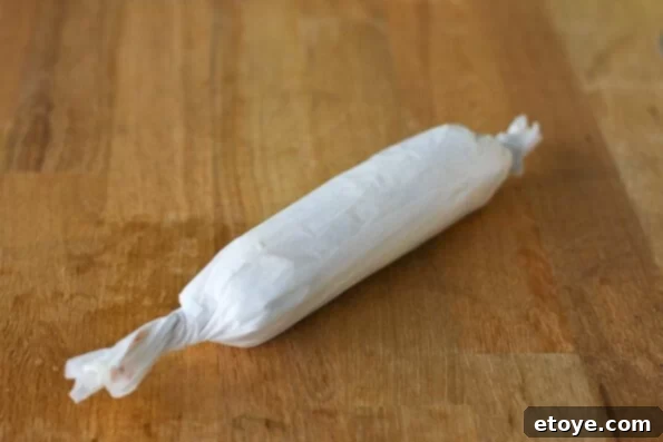 Firming Butter in the Refrigerator Chilling Bacon Blue Cheese Butter Log