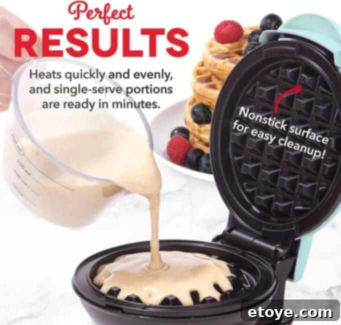 Win Instant Kitchen Gadgets 3 Compact mini waffle maker preparing a small, golden-brown waffle