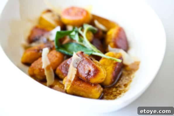 Pan-fried pumpkin gnocchi with brown butter sage sauce and shaved parmesan.