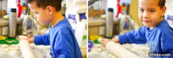 A young boy, Nathan, enthusiastically kneading buttermilk biscuit dough