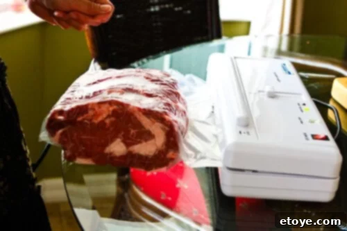 Close-up showing a perfectly sealed UMAi Dry bag around the beef