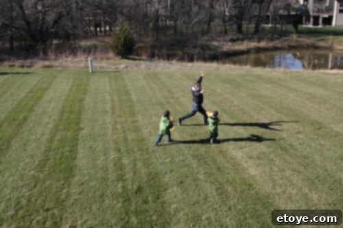 Kids playing hide-and-seek in an open backyard