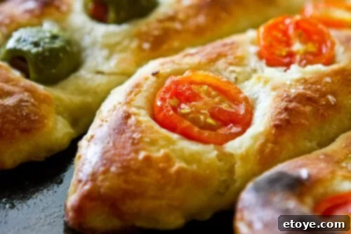 A selection of Jim Lahey's No-Knead Baguettes with various toppings, arranged for serving