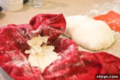 No-Knead Baguette dough after its second rise, showing its airy texture before shaping