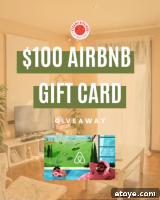 Score a $100 Airbnb Gift Card 2 A person looking at a map, contemplating their travel destination for an Airbnb stay.
