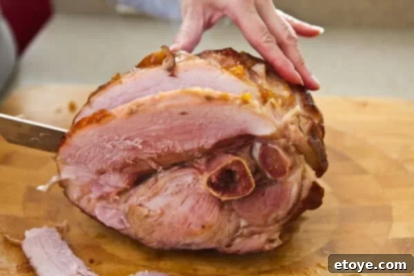 cutting a slice of pork 
