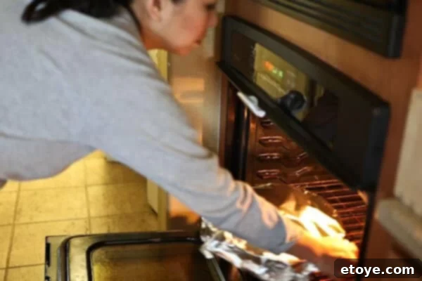 placing glazed ham recipe in oven