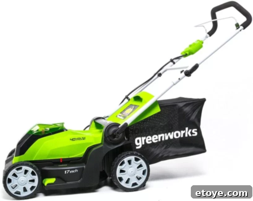 The Greenworks 40V Cordless Lawn Mower smoothly cutting a lush, green lawn