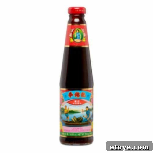 A bottle of Lee Kum Kee Premium Oyster Sauce, a recommended brand for Chinese cooking.