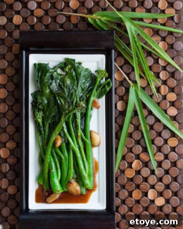A plate of freshly prepared Gai Lan with Oyster Sauce, ready to be enjoyed.