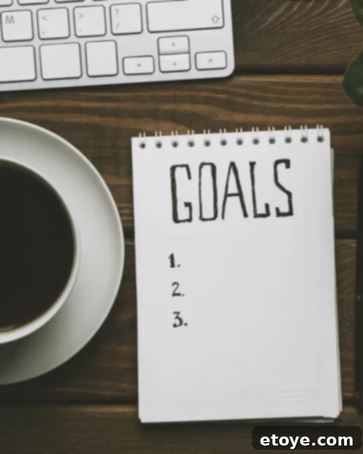 Win an Elliptical Machine 2 Woman writing in a planner, symbolizing goal setting