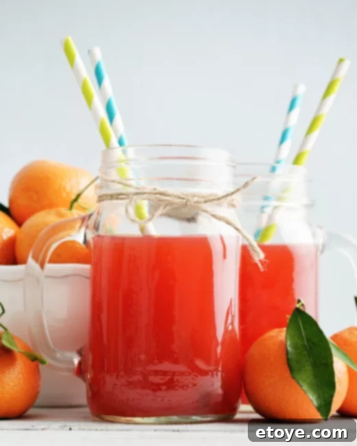 Juice Extractor Giveaway 4 Citrus Sunrise juice with grapefruit, orange, pineapple, and mint