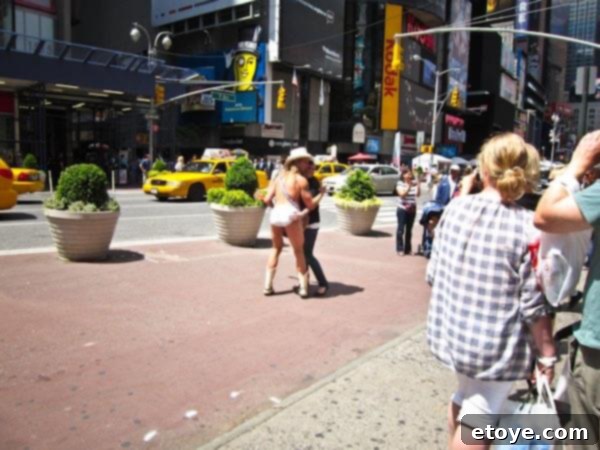 The Master Plan 7 The famous Naked Cowboy performing in Times Square, New York City